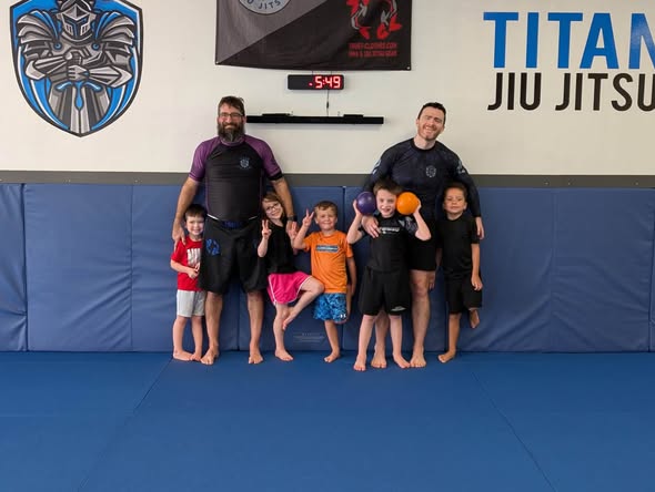 Tiny Titans class with their coaches